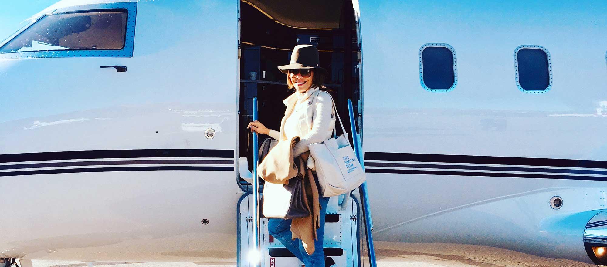 Lisa Simonsen boarding private jet 