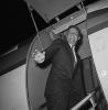 President-elect John F. Kennedy enters his airplane in 1960