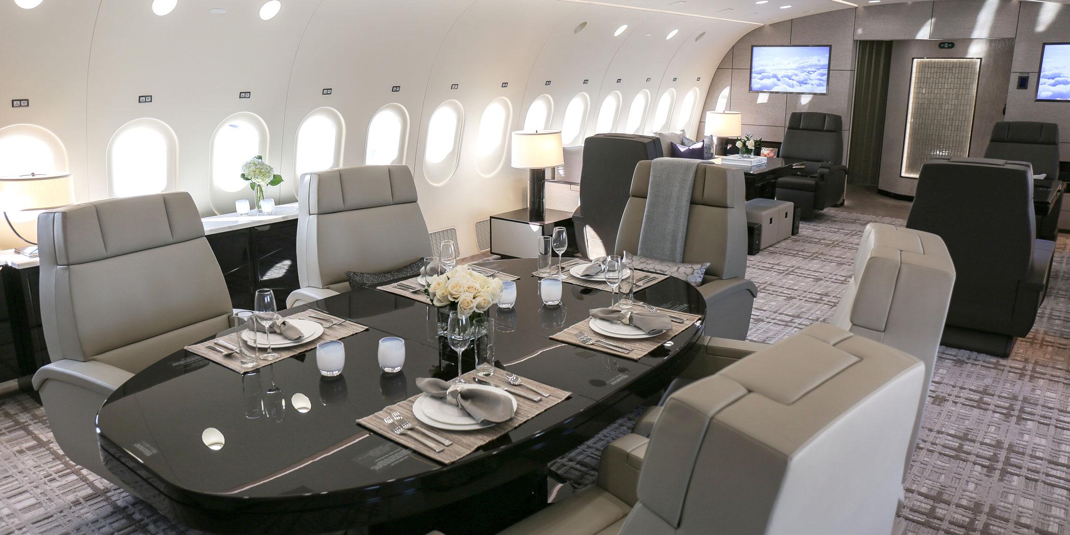 Greenpoint Technologies designed this dining and lounge area in a VVIP 787-8.