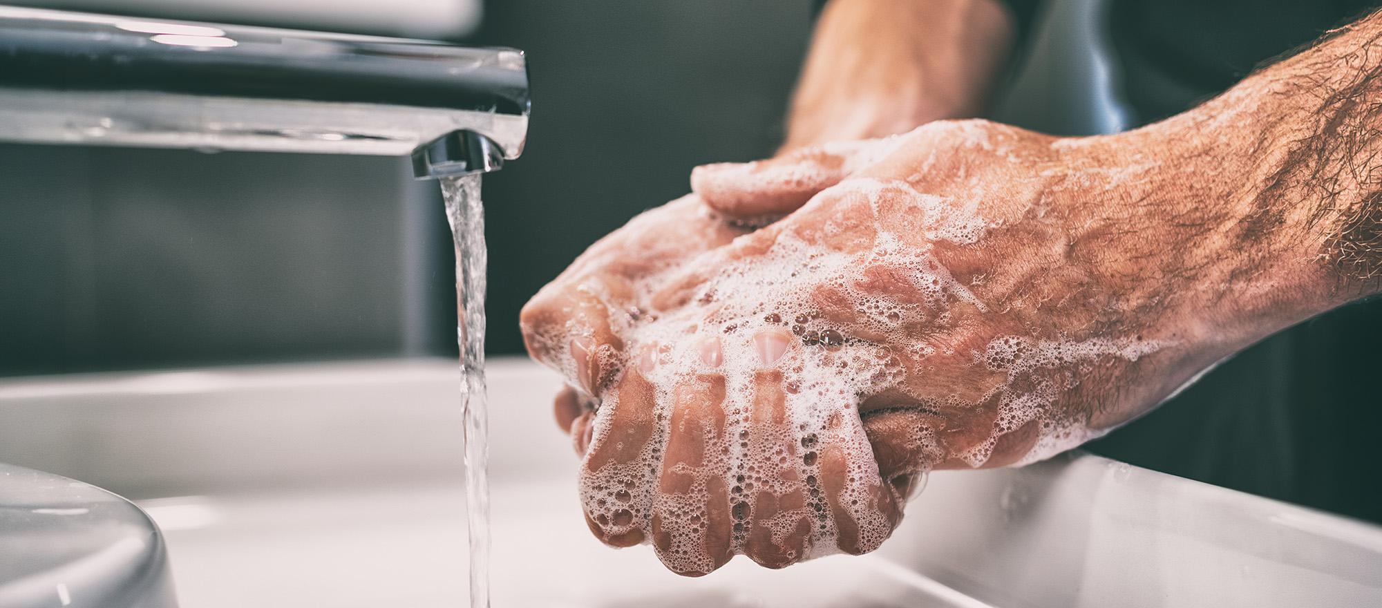man washing hands