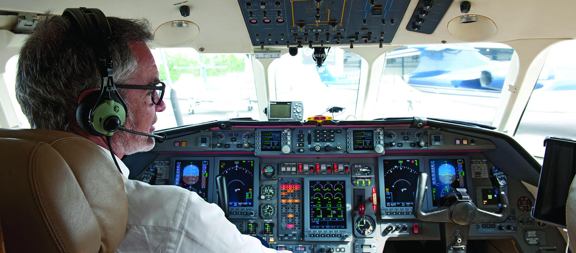 Bob Pittman in cockpit