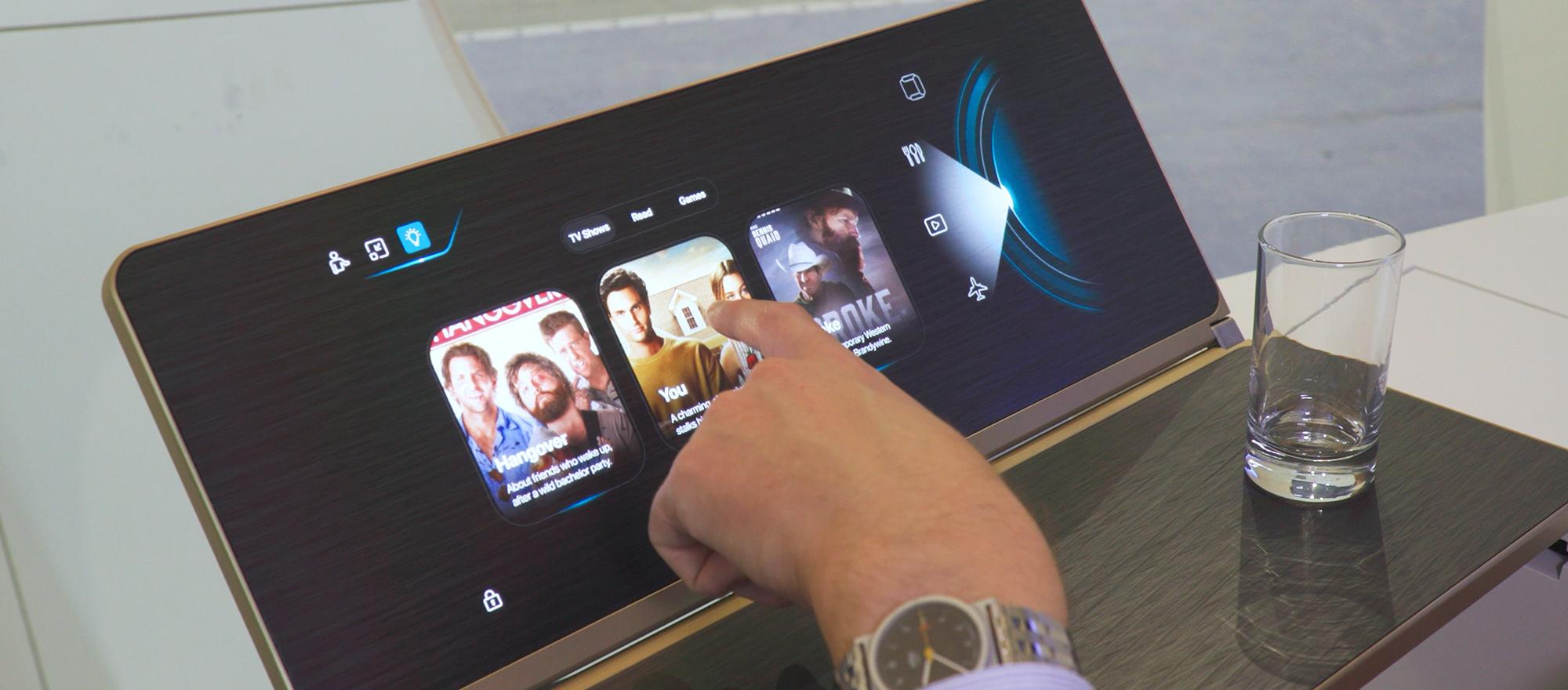 Demonstration of Lufthansa Technik's Nice Intellitable touch screen aircraft tray table