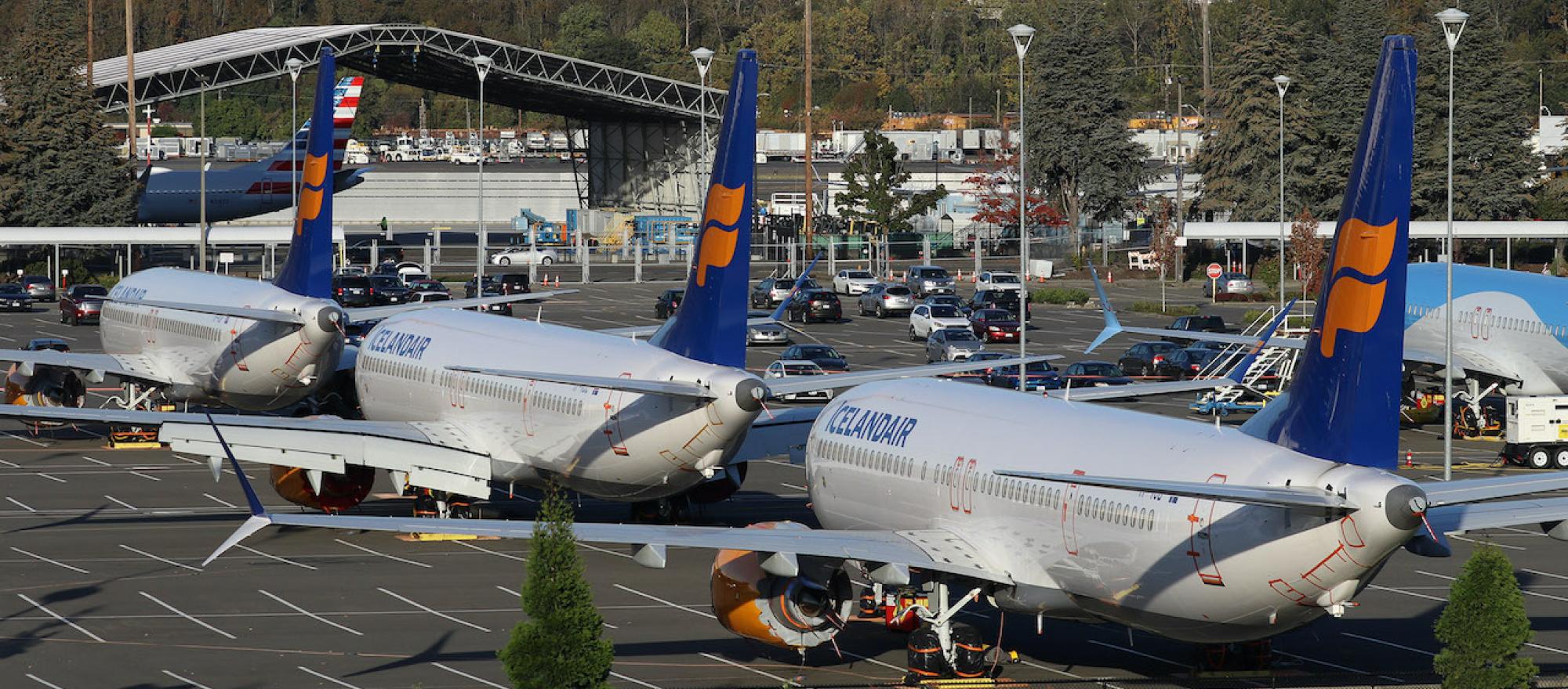 Boeing 737 Max jets sit grounded in a parking lot at Boeing Field in Seattle. (Photo: Barry Ambrose)