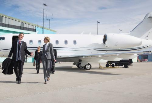 Generic business jet exterior with people