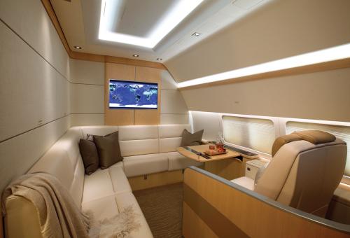 Luxury interior of a Boeing BBJ with pod seats.