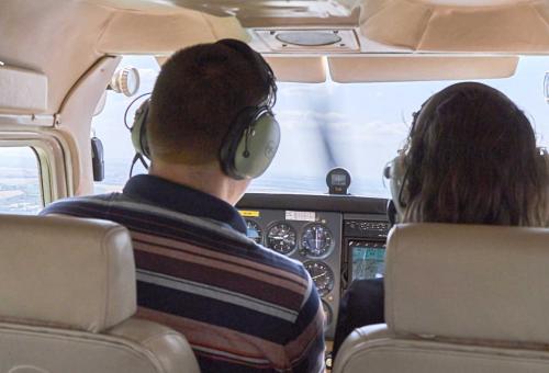 pic of two people in cockpit