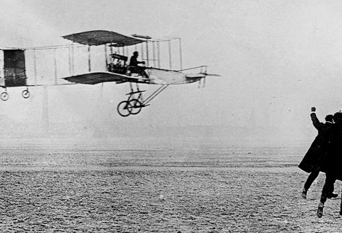  Henri Farman with his Voisin-Farman I 