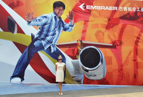 BJT's editorial director Jennifer Leach English in front of a Jackie Chan display (photo: Mona L. Brown)