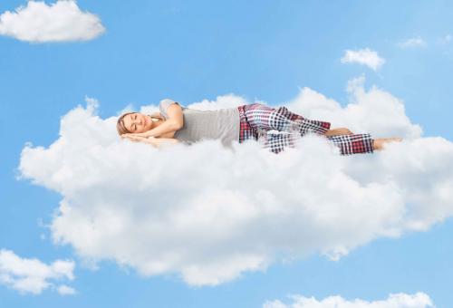 woman sleeping on cloud