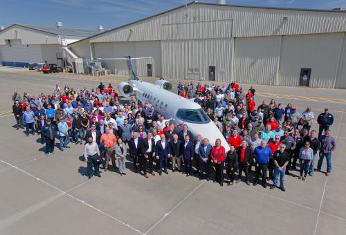 Learjet employees and Bombardier senior executives pose with the final production Learjet to be delivered. (Photo: Bombardier)