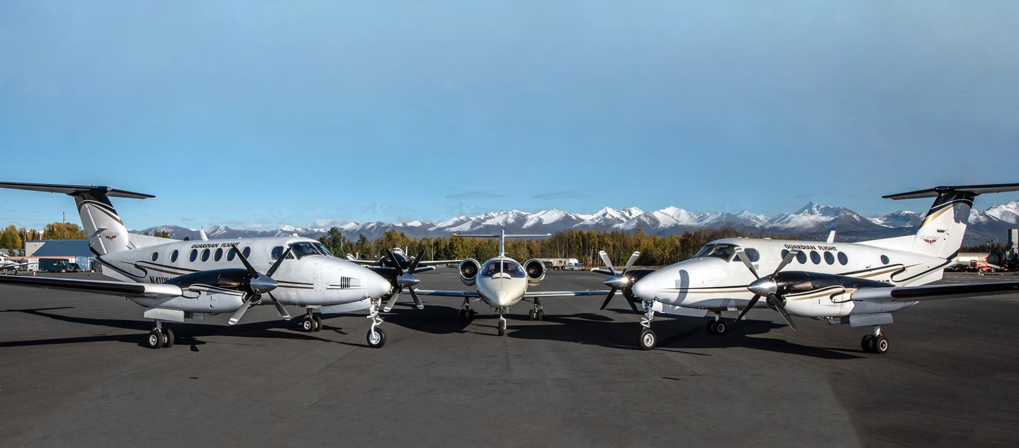 Guardian Flight King Airs and Learjet on Airport ramp