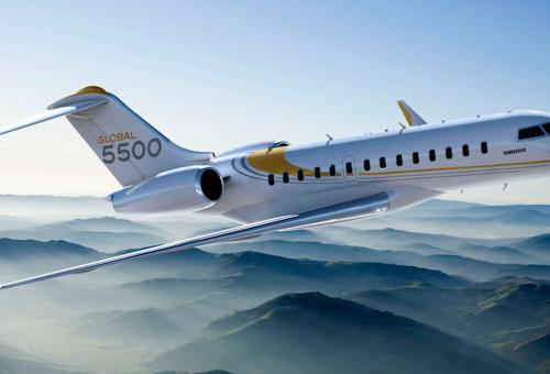Bombardier Global 5500 in flight over fog covered mountains  (Photo: Bombardier)