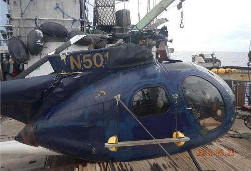 Crashed Hansen helicopter on tuna boat deck