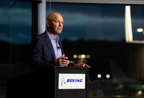 Boeing CEO David Calhoun at podium during the the company's 2022 Investor Conference